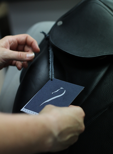 The leather riding saddle is inspected and oiled as soon as it is fully assembled.