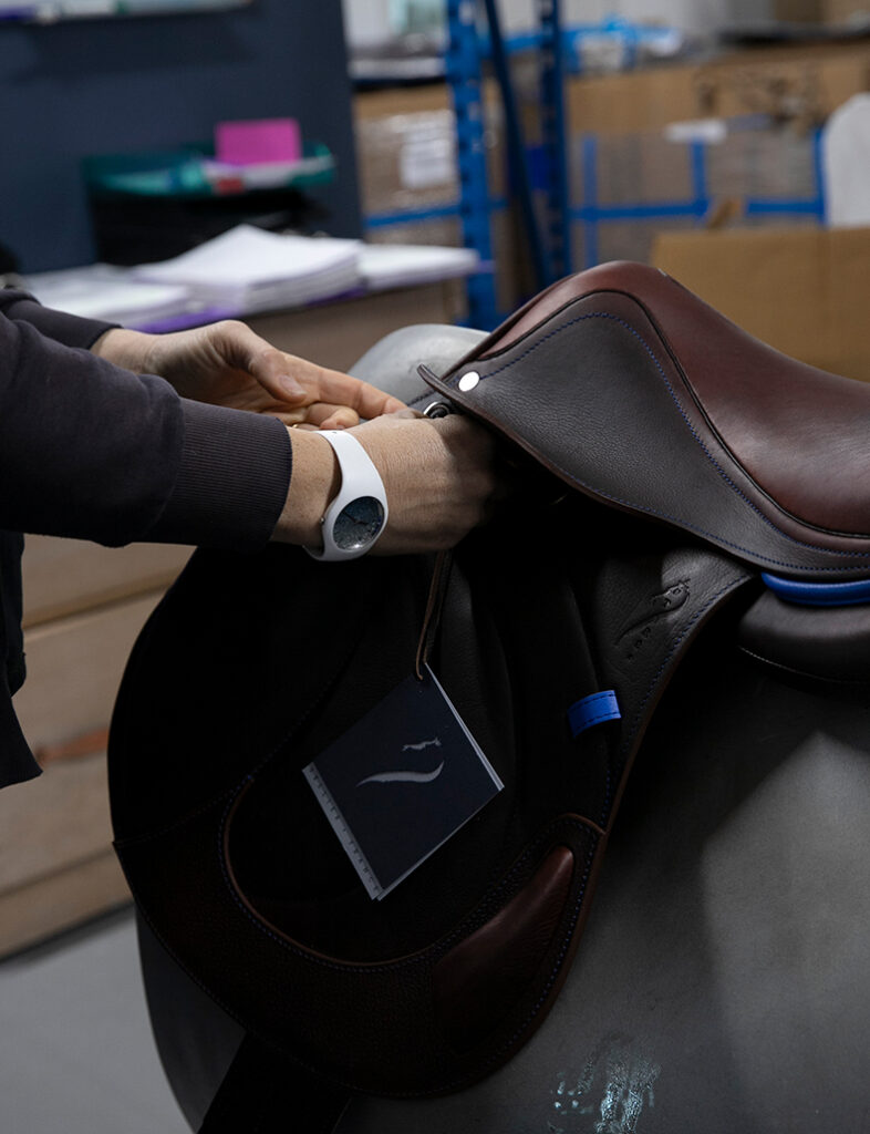 The leather riding saddle is inspected and oiled as soon as it is fully assembled.